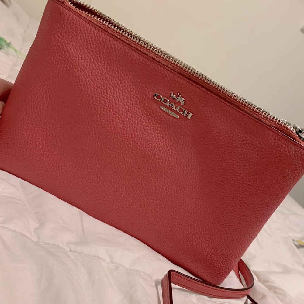 Pink coach crossbody purse